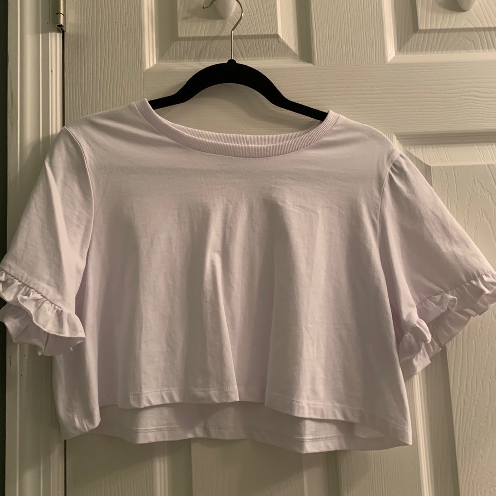 White ruffle sleeved top
